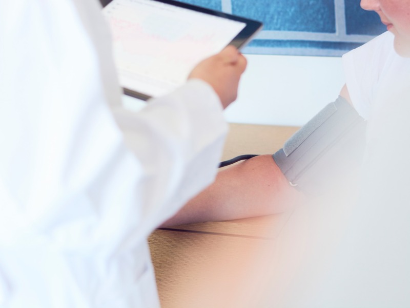 Doctor with tablet in hand